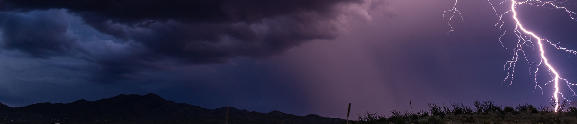 Stormy Monsoon scene with lightning at night